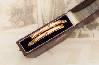 Edwardian Gold, Diamond, Ruby and Sapphire Bangle Bracelet, c.1910