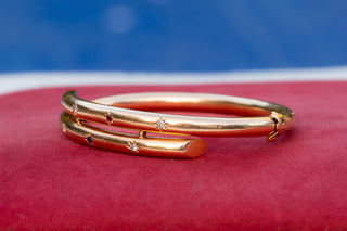 Edwardian Gold, Diamond, Ruby and Sapphire Bangle Bracelet, c.1910