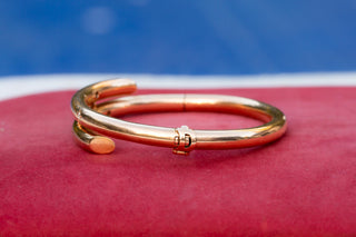 Edwardian Gold, Diamond, Ruby and Sapphire Bangle Bracelet, c.1910