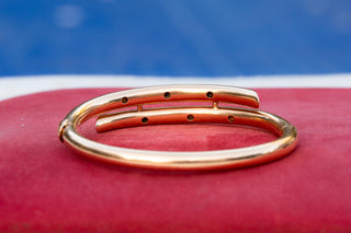 Edwardian Gold, Diamond, Ruby and Sapphire Bangle Bracelet, c.1910