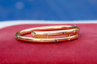 Edwardian Gold, Diamond, Ruby and Sapphire Bangle Bracelet, c.1910