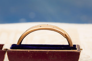Edwardian Gold, Diamond, Ruby and Sapphire Bangle Bracelet, c.1910