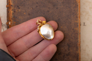 French 19th Century Mother of Pearl and Gold Locket with Rotating Glass Panel, c