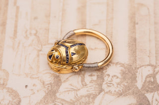 Art Deco French 18K Gold Swivelling Scarab Ring with Calibre Cut Sapphires