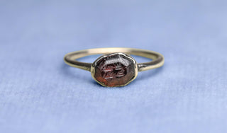 Early Islamic Garnet Intaglio Ring, 10th Century, Later Silver Mount