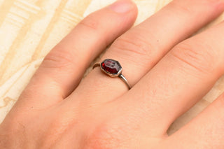 Early Islamic Garnet Intaglio Ring, 10th Century, Later Silver Mount