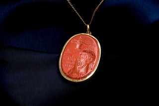 Glass paste intaglio after a Roman magical gem, angled view