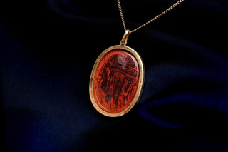 Swirled red glass imitating jasper, reverse view